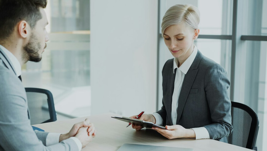 insurance agent with client